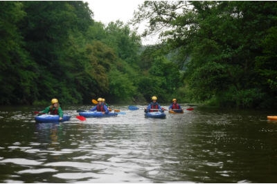 Kayaking on the Symonds Yat rapids on the River Wye, Wye Valley & Forest of Dean
