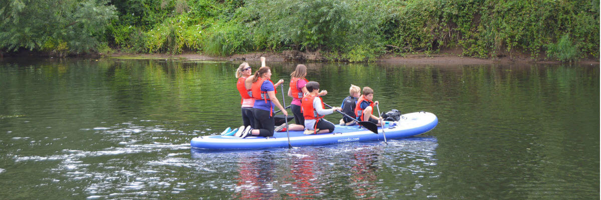 Monty the mega stand-up paddle for group outdoor adventure Forest of Dean Wales